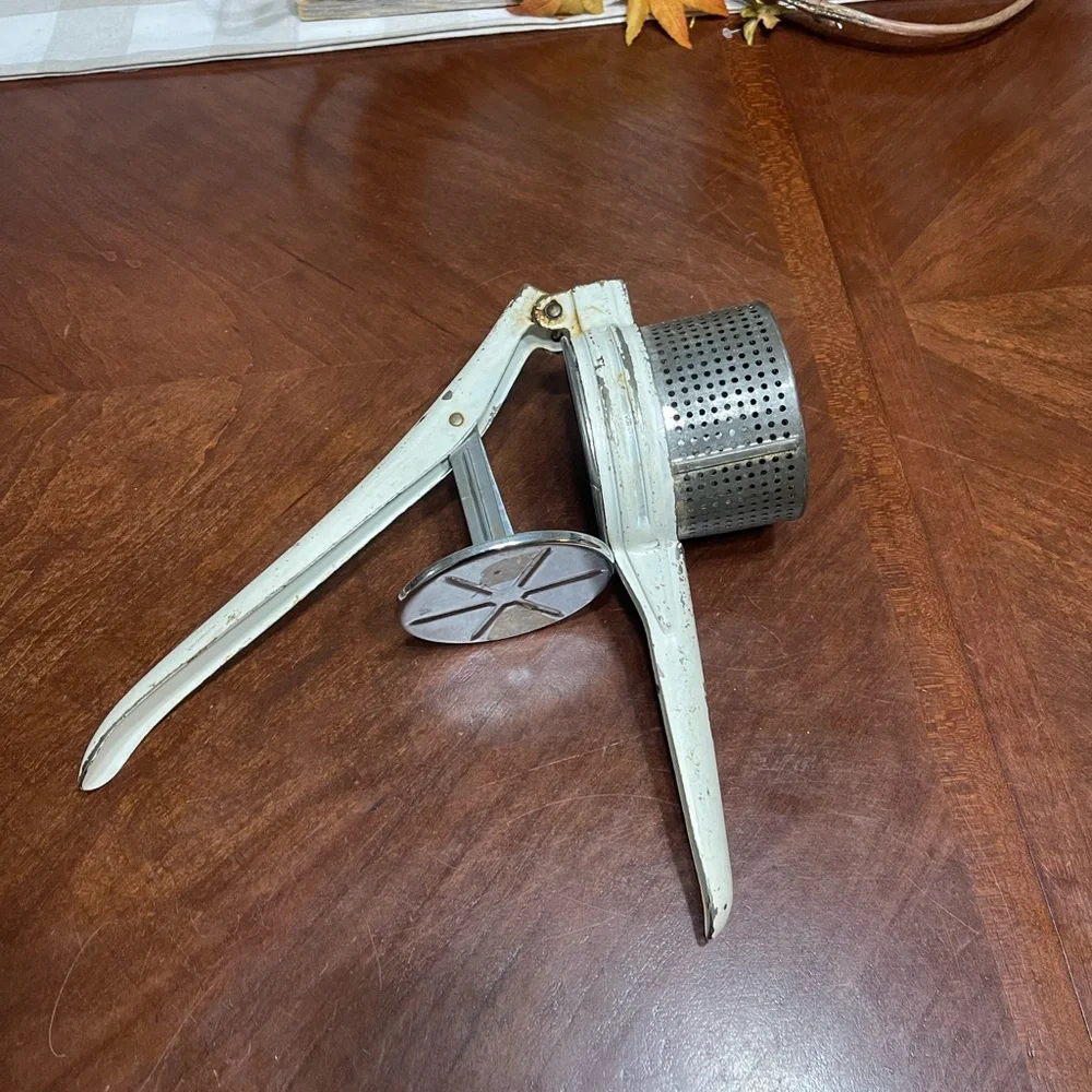 Vintage Handy  potato masher ricer.